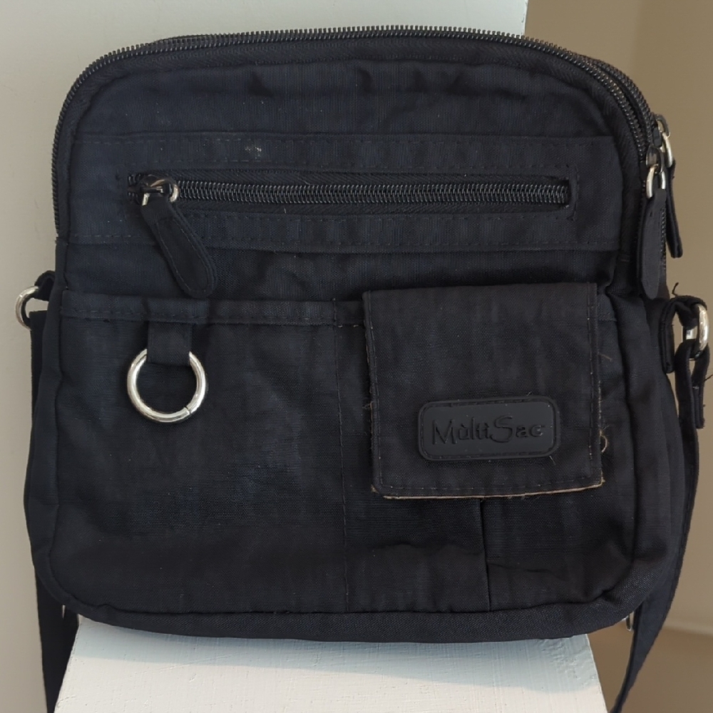 Black Travel Bag with Durable Fabric and Compact Design